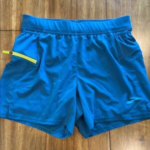 Blue Athletic Shorts with Yellow Accent